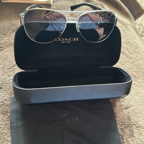 Coach aviator sunglasses lens cloth/case. There are a few scratches on lens. - Picture 2 of 9